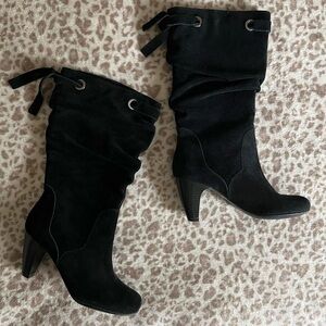 Y2K black high heeled boots with fringe